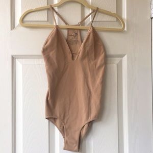 Free People light tan bodysuit size XS/S
